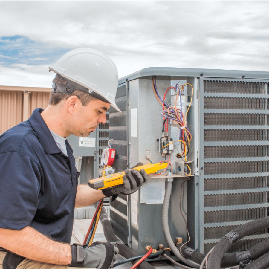Cambridge HVAC Pros HVAC technician servicing a system